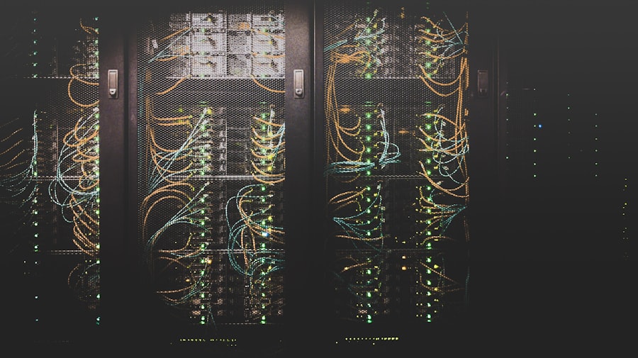Rows of server racks and cabling in a data room.