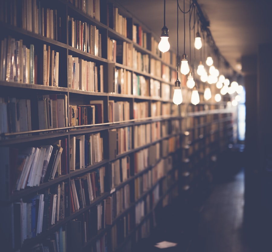 Open books and printed pages stacked across a table.